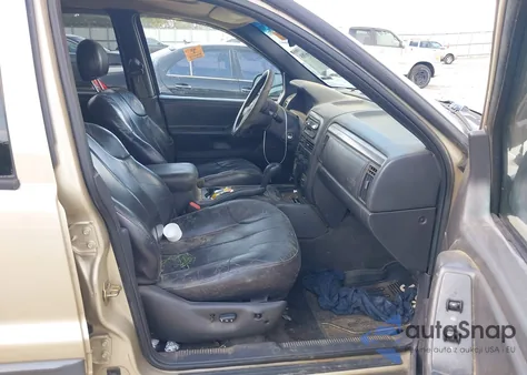 2001 Jeep Grand Cherokee Laredo from USA, damaged, VIN 1J4GX48N21C569315